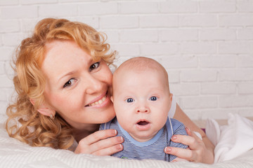 redhead mom's and baby's portrait