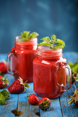 Strawberry smoothie in jars