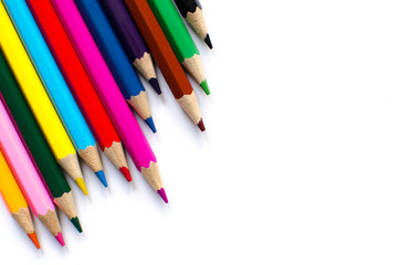 Colored pencils on white background