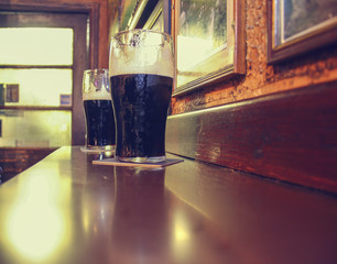 Two dark Irish stout beers