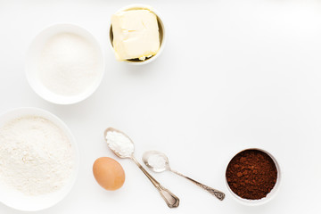 Ingredients for cooking a biscuit Oreo on a white background. Top view