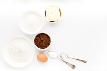 Ingredients for cooking a biscuit Oreo on a white background. Top view