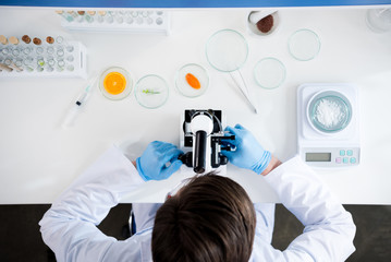 Male scientist during work at modern biological laboratory