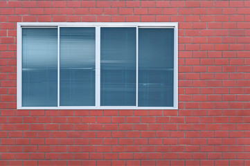 Modern glass window on the brick wall,blanket window (frame)