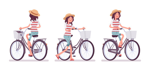 Naklejka premium Young woman cycling a bike
