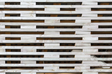 Pattern from lattice fence, created by small wood stripes with rectangular holes in between. For natural pattern, wallpaper or banner design