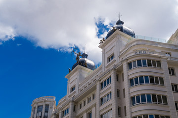 Fototapeta na wymiar Buildings of the street of Madrid called Gran Via
