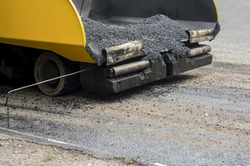 Asphalt pavement machinery working.