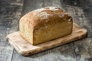 Fresh baked bread on wooden table
