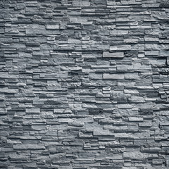 Fototapeta premium pattern of decorative black slate stone wall surface / black stone