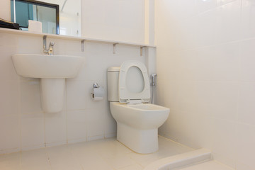 Naklejka na ściany i meble interior white toilet bowl in the bathroom