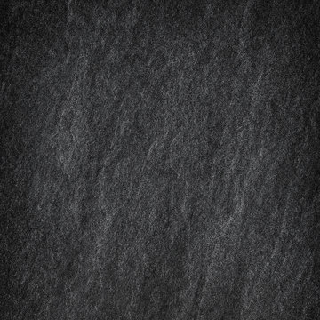Dark grey black slate abstract background or texture.