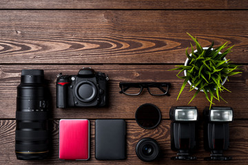 Photography equipment on wooden table