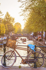 Obraz premium Vintage bike with canal in Amsterdam