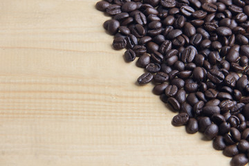 Copy space coffee bean on wooden table close up