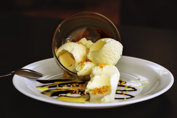 Vanilla ice cream with chocolate and caramel