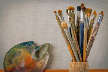 Wooden palette and brush artist