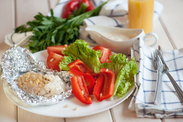 Baked fish with pine nuts