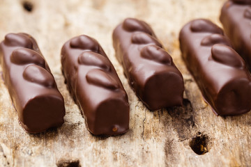 Luxury handmade chocolate  bonbons on wooden background