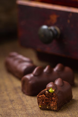 Cut chocolate candy with pistachio