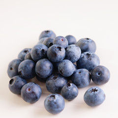 Blueberries on the white background