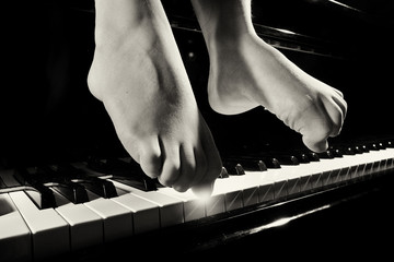 Playing piano Feet