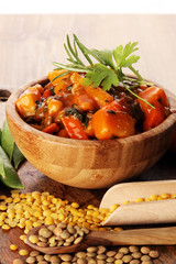 Lentil with carrot and potato in a wooden bowl. Healthy lifestyl