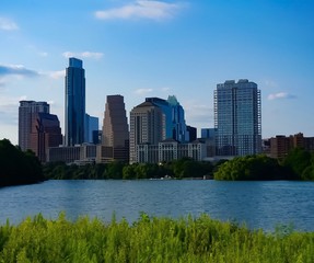 Fototapeta na wymiar A skyline view of downtown Austin Texas from the boardwalk on Lady Bird Lake