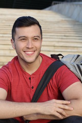 Obraz premium Mixed ethnicity student smiling on campus