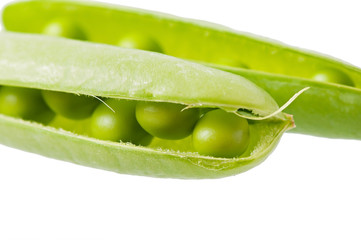 Sweet green peas isolated on white background.