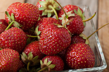 Strawberry on an old wooden background.