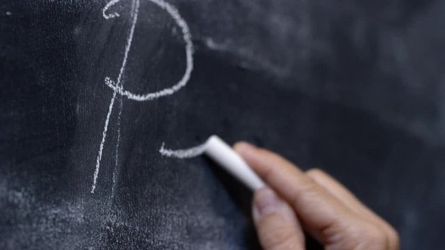 Woman writes on a board, pers