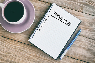 Things to do text on notepad retro styled- top view