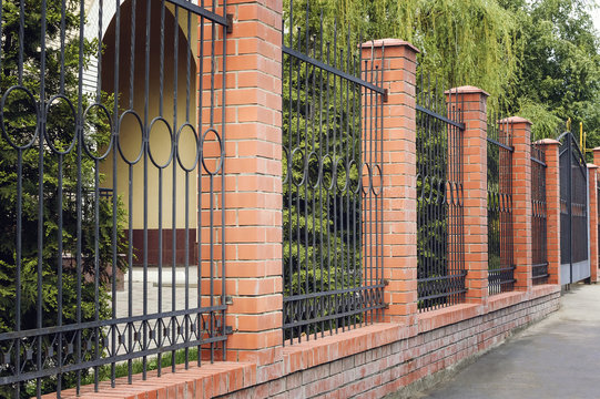 Brick and Metal Fence with Door and Gate of Modern Style Design Metal Fence Ideas.