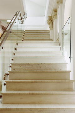 Marble stairs with glass banister