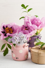 Kraft gift box, peonies and lilac flowers