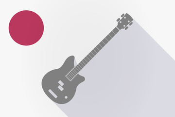 Obraz premium Long shadow Japan flag with a four string electric bass guitar