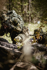 Military men with submachine gun