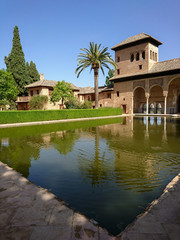 Reflection of the Partal Palace on a pond, Alhambra, Granada