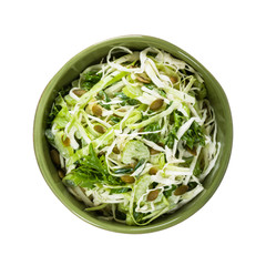 Coleslaw Cabbage Salad with Pumpkin Seeds Isolated on White background. Selective focus.