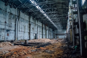 Large abandoned industrial hall of Voronezh excavator plant