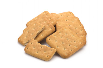 Stack of square crackers isolated on white background. Dry cracker cookies isolated
