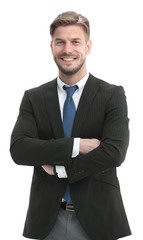 Successful young man in full suit smiling.