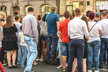 A crowd of people watching the event