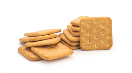 Stack of square crackers isolated on white background. Dry cracker cookies isolated