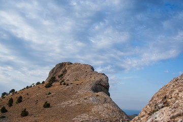 Mountain top, stunning view, blue sky with clouds