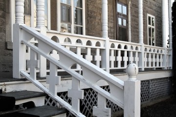 Balcony railing with white wood railing consisting of white crosses