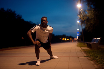 African american fitness handsome man training. Jogging at the evening..