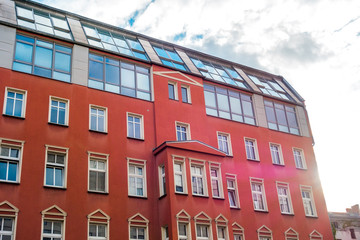 red building with glass roof and sunlight