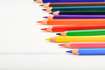 Fototapeta premium Colored pencils on white background